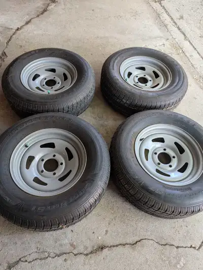 Set of 4 , 204/75R14 wheels and tires. 5 on 4.5" spacing-standard. Great condition lots of tread lef...
