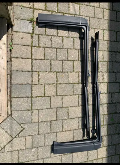 These are used Jeep Wrangler JKU soft top door surrounds, ready to give your ride that open-air free...