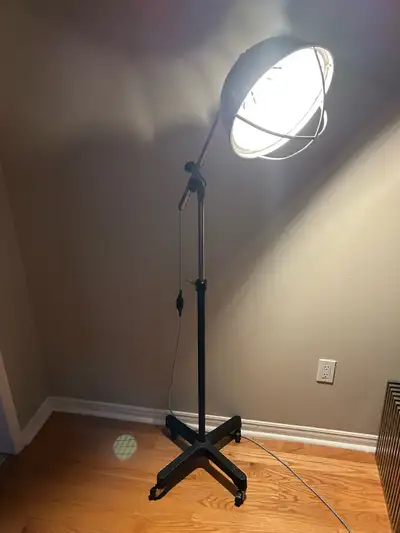 This one-of-a-kind industrial floor lamp is a breathtaking fusion of medical history and modern desi...