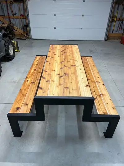 Full custom made out of 2x4 steel tubing powder coated black. Wood is 2x6 cedar and sealed to last b...