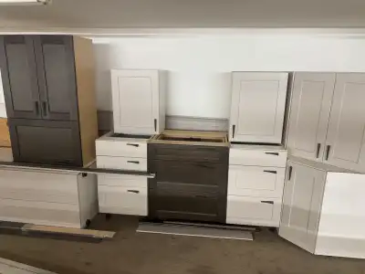 Have a set of kitchen cabinets and granite counter top insert microwave and stainless steel sink out...