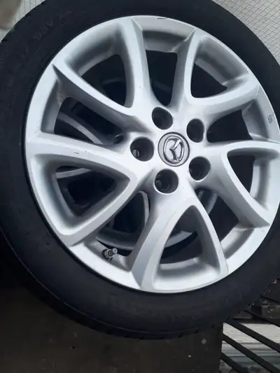 Mags 5x114.3 tires 205/50/17 Nokian Tires wear is not even, from 5/32 to 8/32 400$ No Nego.