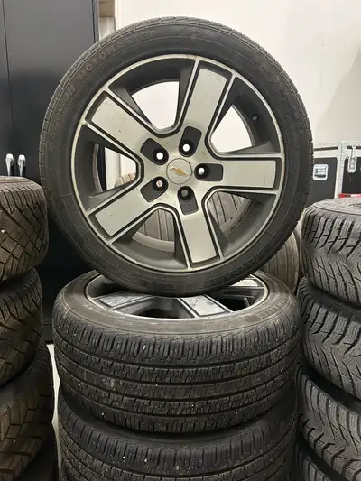 These rims came off a 2014 Chevy Orlando. Tire size 235/45R18. The remaining tread depth is 8/32”. T...