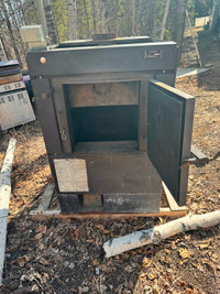 Forced air wood burning furnace  3500 obo