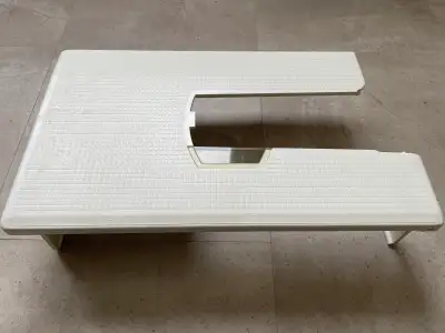 I'm selling a sewing machine extension table that significantly broadens the workspace for larger se...