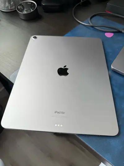 iPad Air 13” 128GB hard drive with a Moko case. Purchase in 2025, so only 1 year old. Battery at 100...