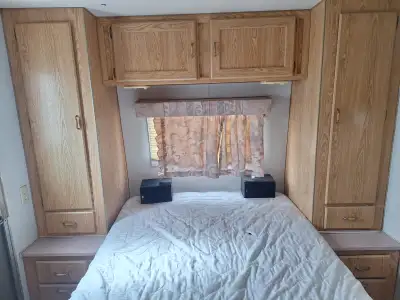 1990 RV TRAILER BUMPER PULL WITH NO ROOF LEAK NO SMOKING NO MICE NO PETS NO KIDS. NO RIP UP FLOORING...