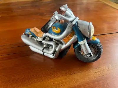 Vintage blue with yellow flames motorcycle bank, View more
