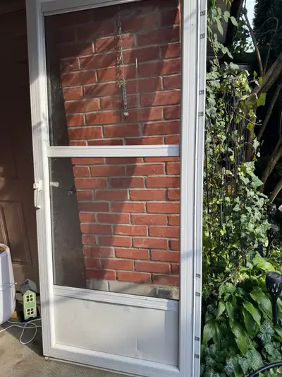 strom door with retractable screen size is 34” x 80”, View more