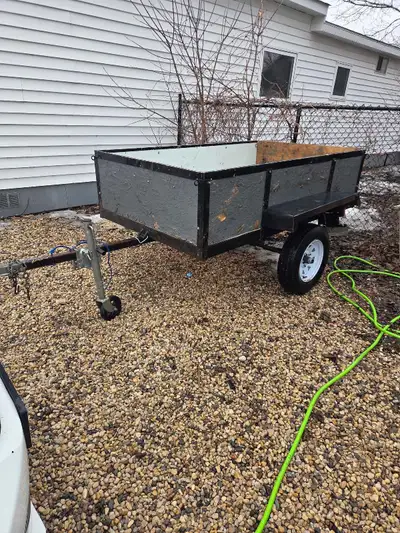 4/7 trailer new axle new tires and lights also, tilt 950 obo