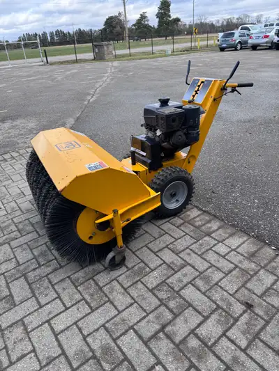 M-B Companies Inc A COMMERCIAL WALK BEHIND BROOM FOR MANY APPLICATIONS. CLEAN AND CLEAR SNOW, DIRT D...