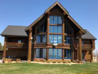Waterfront Property. Luxurious hand crafted Log home