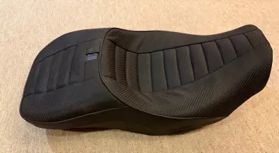 The seat is like new. It is the Tall Boy version. It fits 23 1/2 CVO and 24 and later Road Glide and...