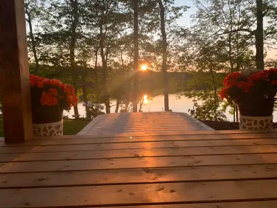 Imagine stepping out your door and onto your kayak—this stunning lakefront home in Fall River, Nova...