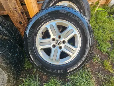 I have 4 - 2006 honda pilot rims with newer tires summer/all season. Eliminator x-trail A/T., really...