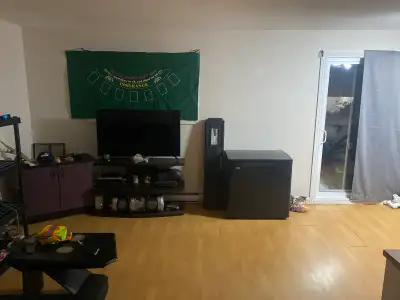 4 1/2 a partager a rimouski secreur Arthur-Buies Entièrement meuble sauf votre chambre Porte patio-b...