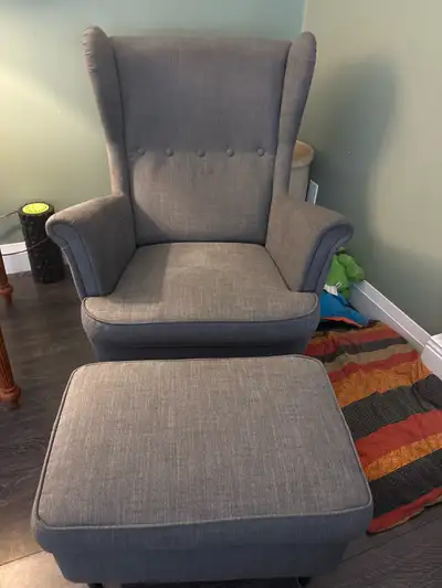 Upgrade your living space with these 2 comfortable and stylish grey IKEA Strandmon wingback chairs,...