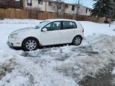 2008 Volkswagen Rabbit (Golf Mk5). 2.5L five-cylinder, automatic, 210,000 miles. Still runs strong—n...