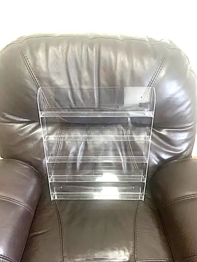 This is a wall mount clear Plexiglass ornament/display/nicknack unit. Has 4 holes for mounting (no m...