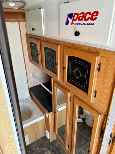INSTANT TOY-HAULER PLUG-AND-PLAY ROCK SOLID The 3 main pieces (dinette booth and 2 bathroom pieces)...