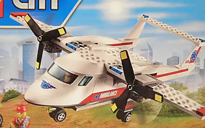 Lego Retired - Never opened, factory seals intact - Set Contains ambulance plane, a motorcycle and 3...