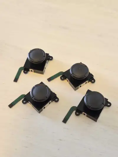 Replacement thumb sticks for the Nintendo Switch. Fix stick drift! Compatible with all Joycons and S...