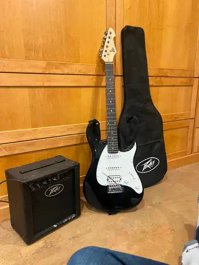 Peavey Raptor Plus electric guitar and amp., View more