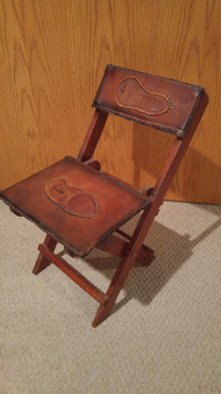 Decorative Leather and wood chair.