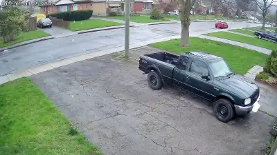 two cars out side parking cover tool box storage .