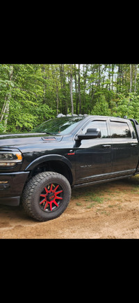 20" ION Wheels with 35" AMP tires.