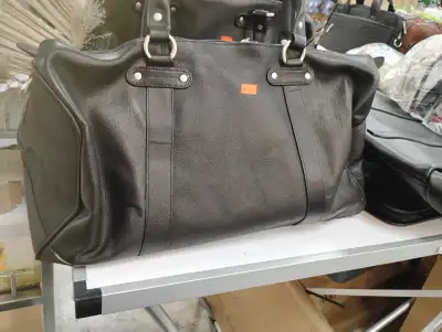 Bugatti and bags and duffle bags, View more
