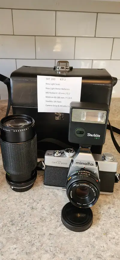 Vintage Minolta SRT200 Film Camera from 1975....... New Light Seals New Light Meter Batteries Camera...