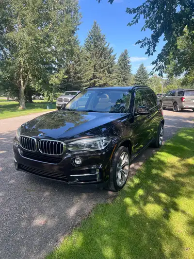 Well Maintained BMW X5 35i fully loaded including Heads Up Display, Winter Rims, Tires and storage c...
