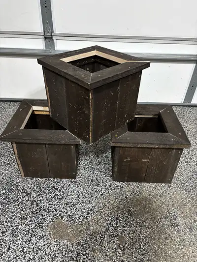 Rustic rough wood stained plant boxes. Meant to place a pot inside. False bottom can be whatever hei...