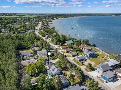 Fully renovated, three season cabin with sunset lake views and 1 minute walk to Lac St. Anne lake ac...