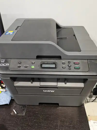 For sale is a Brother Multifunction DCP-L2540DW wireless laser printer with 2 extra toners.