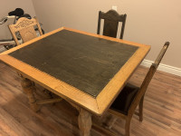 Vintage wood table with sleeves and chairs