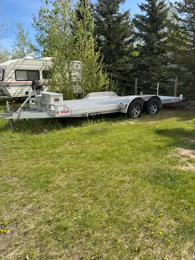 Includes … Trailer , wench & tool box Tilt deck 18”x8” Pretty much brand new.. only used a few times...