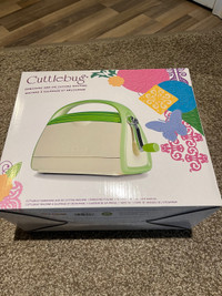 Cuttlebug embossing and die cutting machine plus accessories 