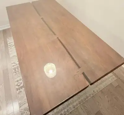 Solid acacia wood dining table in excellent condition. Hardly used since we have another dining set....