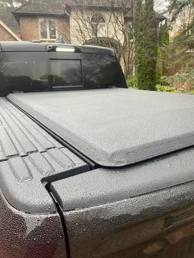 Fits 2021 through 2026 Dodge ram with a 5‘7“ bed with the Ram box. Soft cover trifold easy removal a...