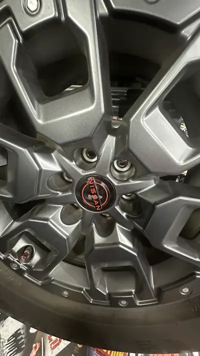 4 OEM Beadlock Nissan Rims with Michelin x ice winter tires for 2022 and up Nissan frontier trucks....