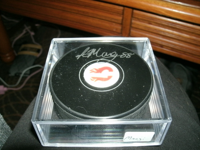 Autographed Calgary Flames puck by Andrew Mangiapane in Arts & Collectibles in Ottawa