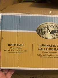Hampton Bay chrome finish bath bar has 8 bulb fixtures.