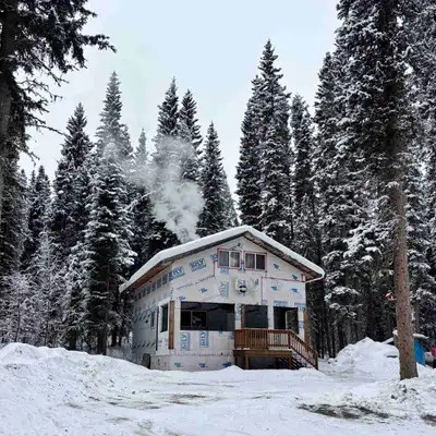 Discover the ultimate off-grid retreat with this charming cabin, nestled amidst a serene forest sett...