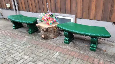 This concrete curved garden bench is a charming addition to any outdoor space, offering both seating...