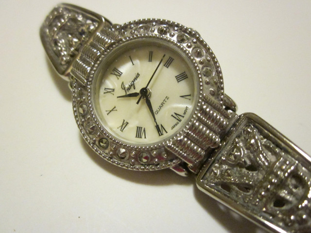 SILVER FILIGREE WATCH PEARLESCENT DIAL WORKING in Jewellery & Watches in St. Catharines