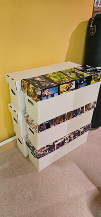 Mystery boxes of assorted comics and graphic novels