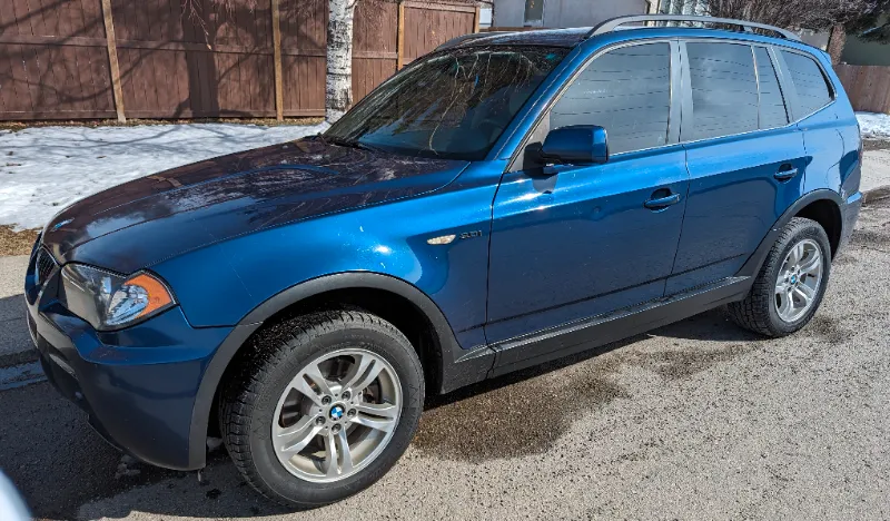 2006 BMW X3 - New winter tires on rims and tinted windows!