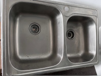 Kitchen sink with soap dispenser 